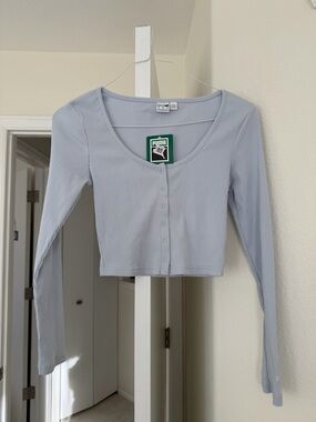 Puma light blue ribbed long-sleeve cropped cardigan. Size M NWT